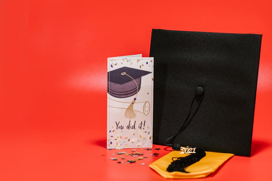 Graduation cap beside paperwork showing graduation GPA and credit completion rules
