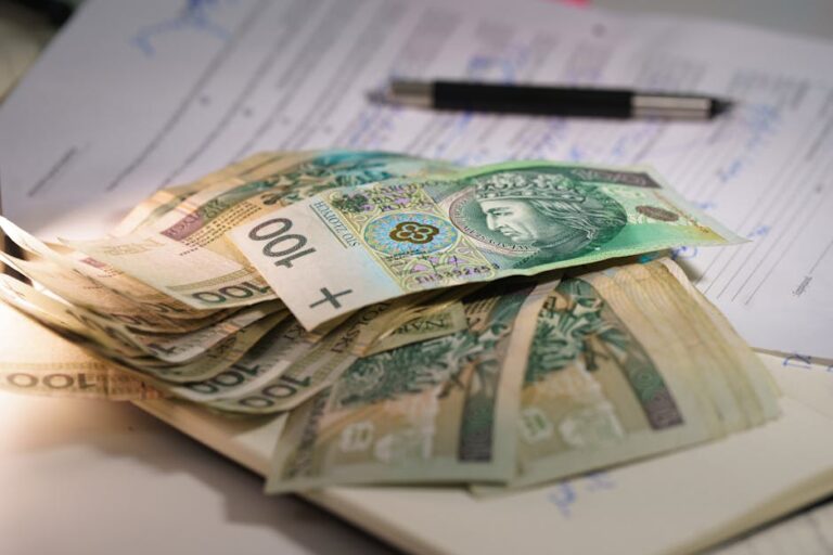 Student comparing Master’s vs. PhD: Key Differences, Costs, Funding, and Career Outcomes on a study desk.