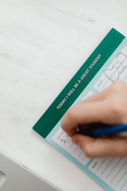 Student using a checklist planner to track merit scholarships and aid deadlines