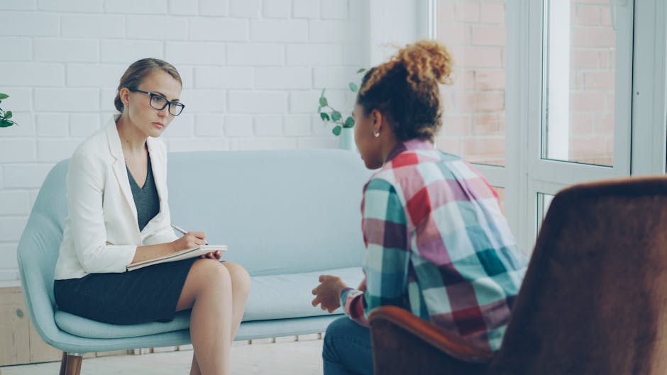 Student meeting with a counselor in a calm, supportive office