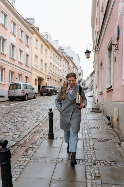 International students walking through a budget-friendly European city street near transit