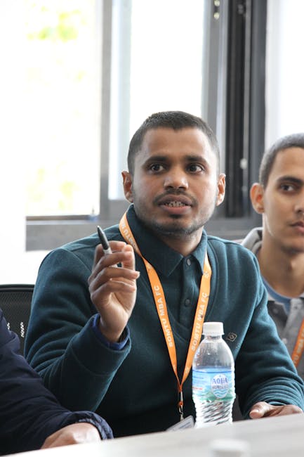 Students networking at a campus event, showing community and career momentum