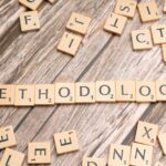 University campus with diploma papers, search results about The Ultimate Guide to University Accreditation and Ranking Methodology—What Matters and Why