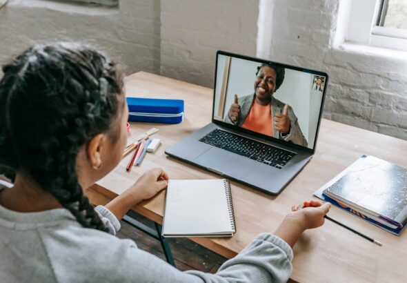 Students using tablets for Virtual Tours and Online Open Days during digital school visits, classroom view on screen