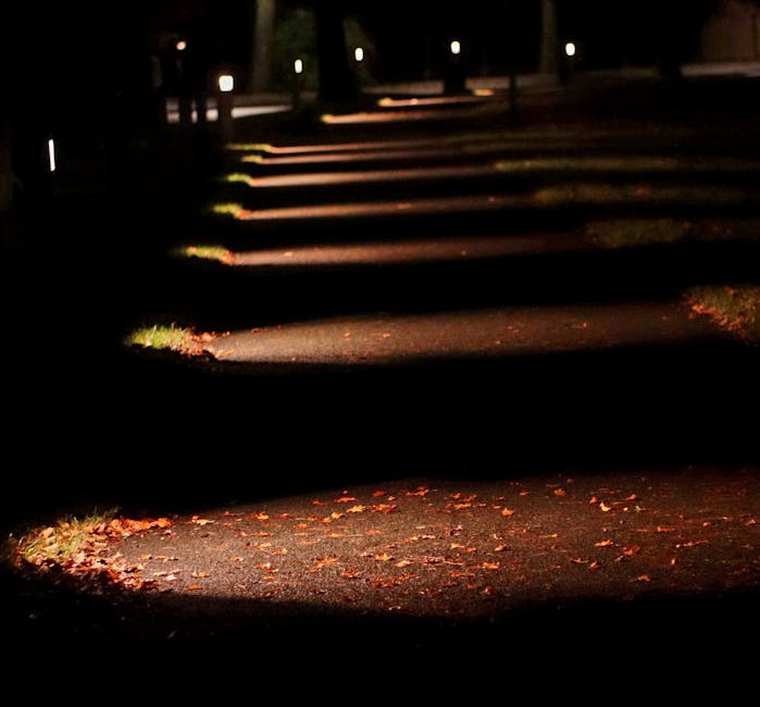 Well-lit campus walkway at dusk showing controlled access and safe routes to key locations