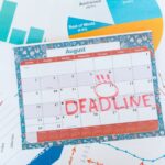 Planner with notes and calendar dates for “Deadlines That Matter,” organizing applications, exams, and documents