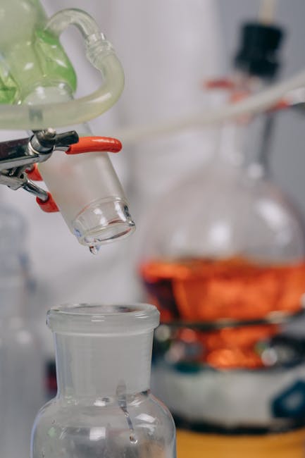 Student using lab equipment during a chemistry or biology experiment