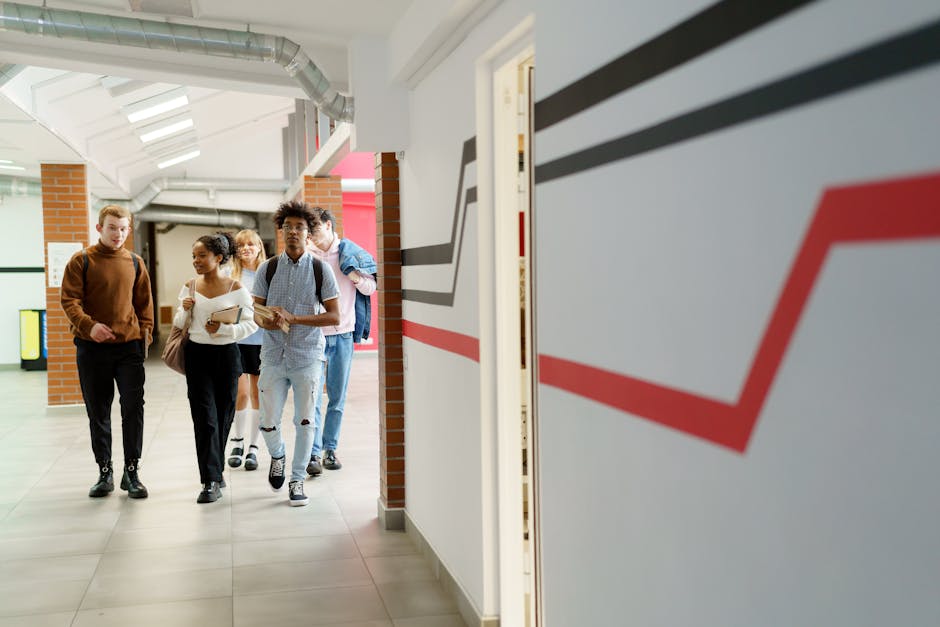 Student walking through a dorm hallway, highlighting housing comfort and routines