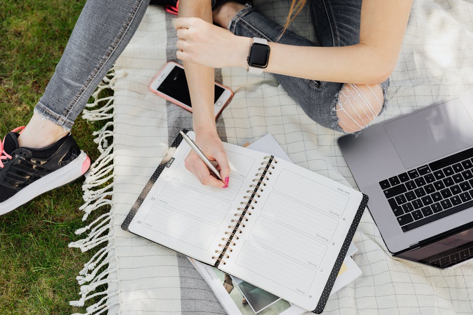 College student planning an internship application schedule on a laptop
