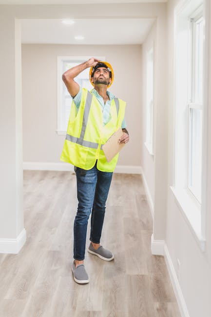 Student checking a residence room window, bathroom, and electrical outlets during a tour