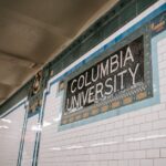 Students comparing Public vs. Private Universities on a side-by-side chart of costs, quality, and outcomes.