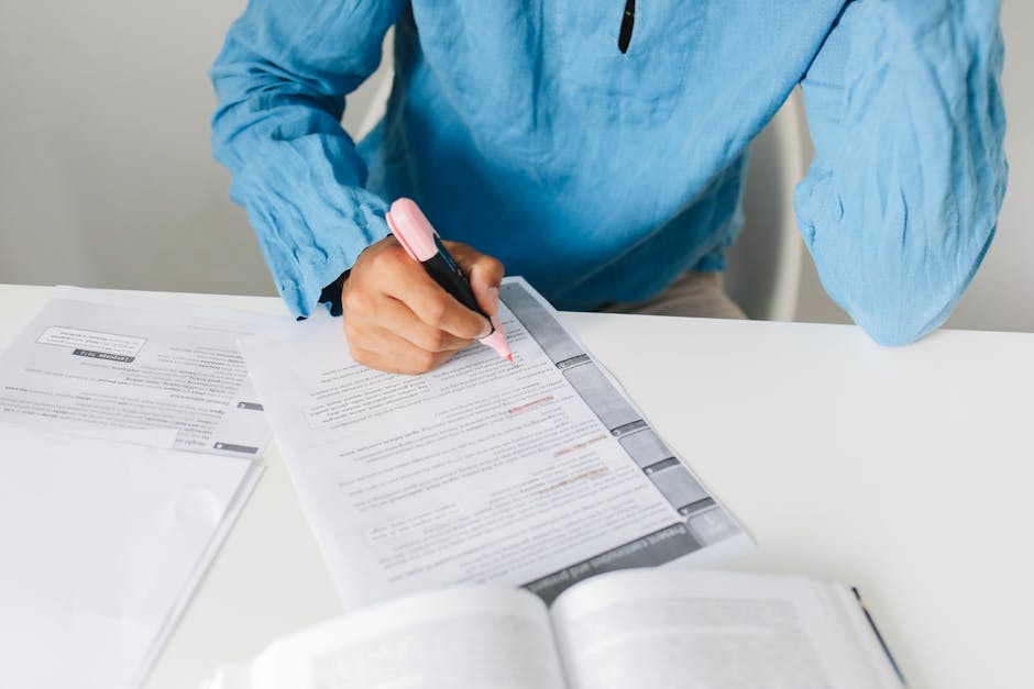 Student looking at a syllabus and calendar to list course deadlines