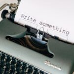 Writing a Winning Statement of Purpose: Structure, Prompts, and Real-World Examples shown by a writer at a desk.